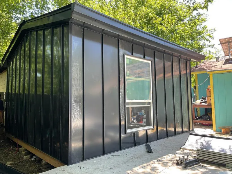 Black standing seam metal wall panels for Metal Roof Installation in Trenton